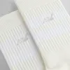 Kith Striped Mid Crew Socks With Script Embroidery - Sandrift sold by Kith