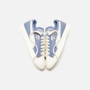 Puma x Rhuigi Clyde - Pristine / Inky Blue sold by Kith