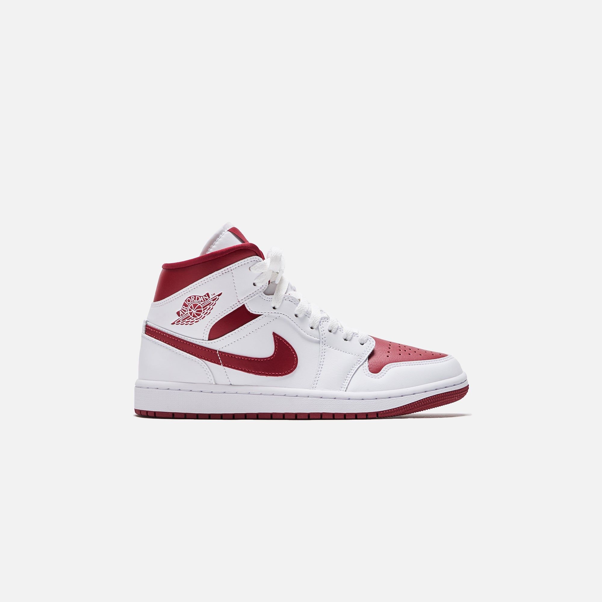 Nike WMNS Air Jordan 1 Mid - White / Pomegranate sold by Kith