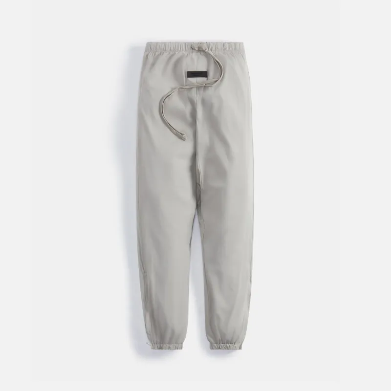 Essentials Woven Nylon Track Pant - Seal sold by Kith
