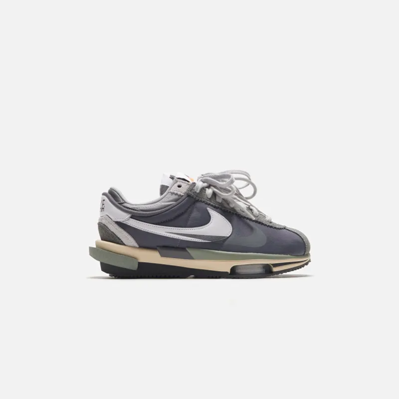 Nike x Sacai Zoom Cortez - Iron Grey / White / Light Cream sold by Kith
