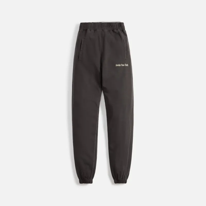Awake Pigment Dyed Embroidered Sweatpant - Black sold by Kith