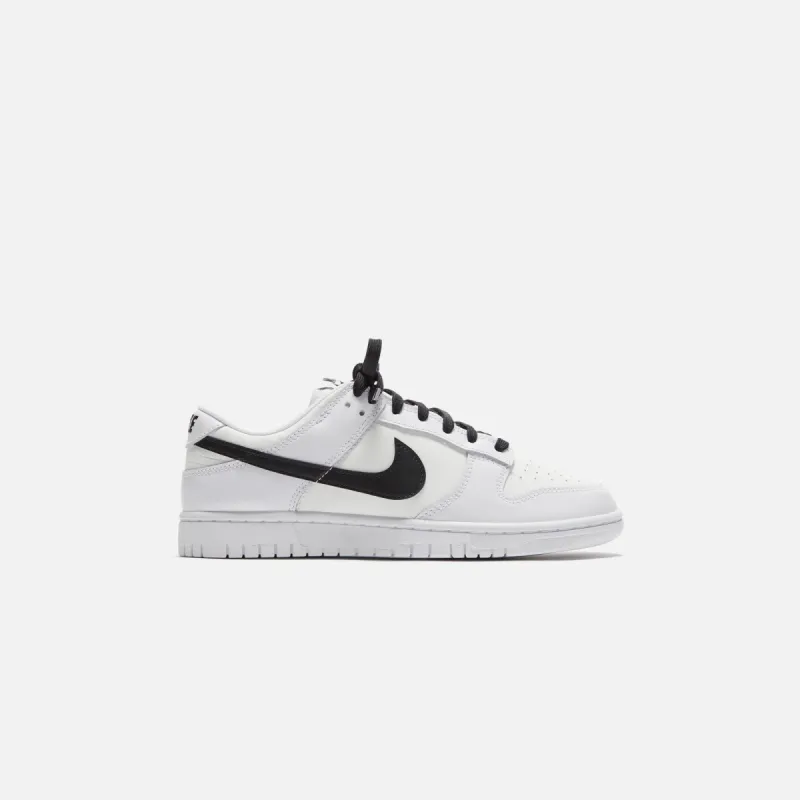 Nike Dunk Low Retro - White / Black / Summit White sold by Kith