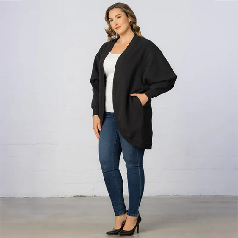 Open Front Faux Fur Cardigan with Pockets - Sale! sold by Kiyonna
