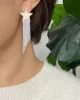 Star Shine Cascade Earrings sold by Kiyonna