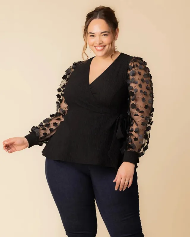 Scattered Petals Long Sleeve Wrap Top sold by Kiyonna