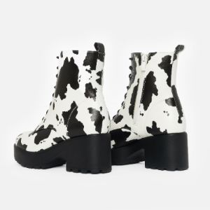 DAISY Platform Cow Print Military Boots sold by Koi Footwear