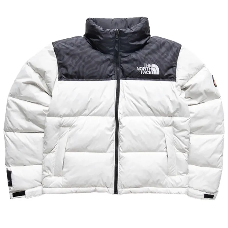 The North Face 1996 Retro Nuptse Jacket White Dune TNF Black sold by Kong