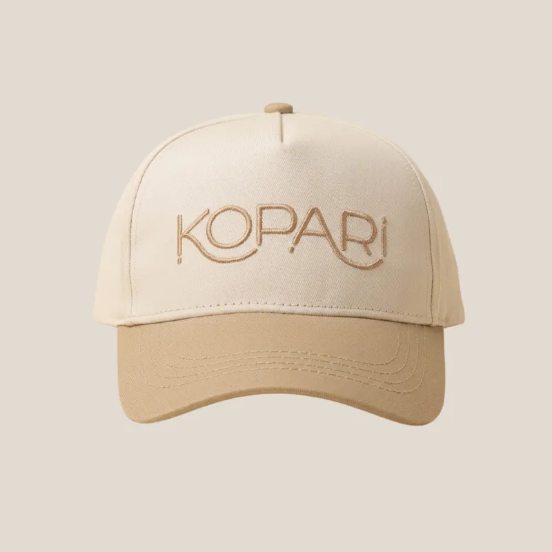 Kopari Embroidered Trucker Hat made by Kopari
