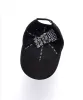 SIGN ON THE TIMES CAP BLACK sold by Ksubi