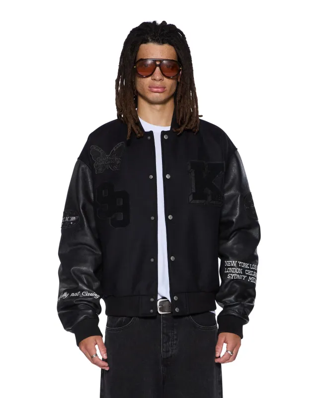PATCHED VARSITY JACKET BLACK sold by Ksubi