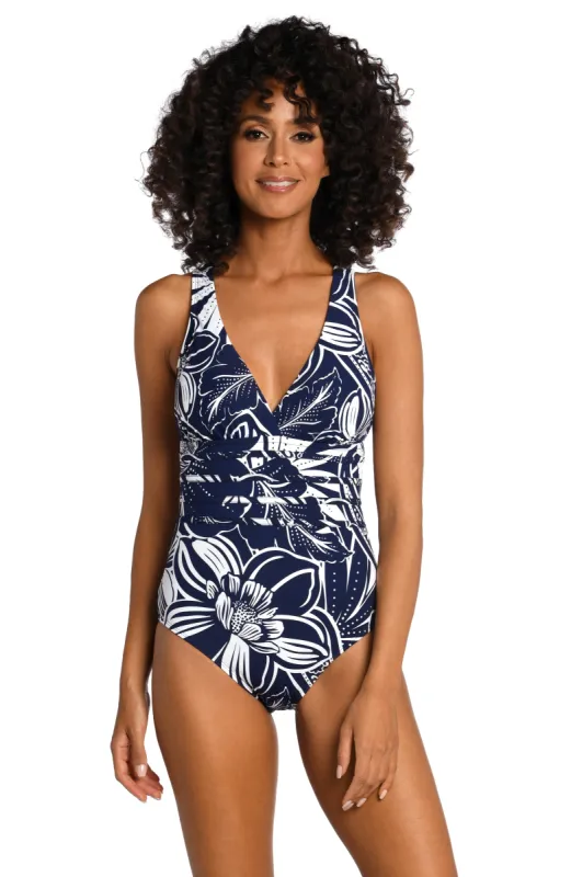 At The Playa Multi-Strap Cross-Back One Piece sold by La Blanca