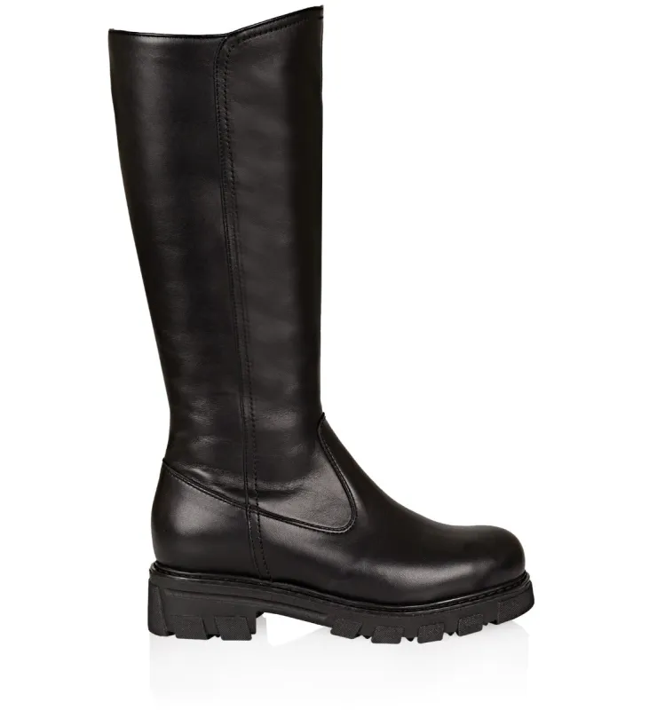 AXEL SHEARLING-LINED LEATHER BOOT sold by La CANADIENNE