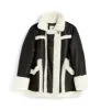 FLORENTINE LEATHER AND SHEARLING COAT sold by La CANADIENNE