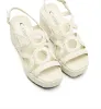 PEPPY WOVEN LEATHER WEDGE SANDAL sold by La CANADIENNE