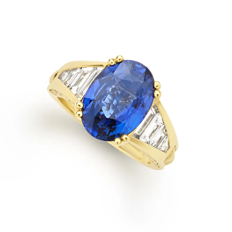 SML 18K Gold Oval Blue Sapphire and Diamond Ring sold by LAGOS