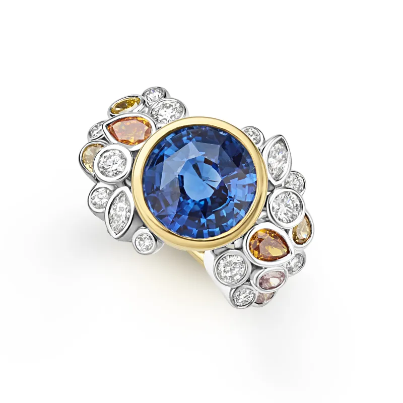 SML 18K Gold and Platinum Blue Sapphire Colored Diamond Ring sold by LAGOS