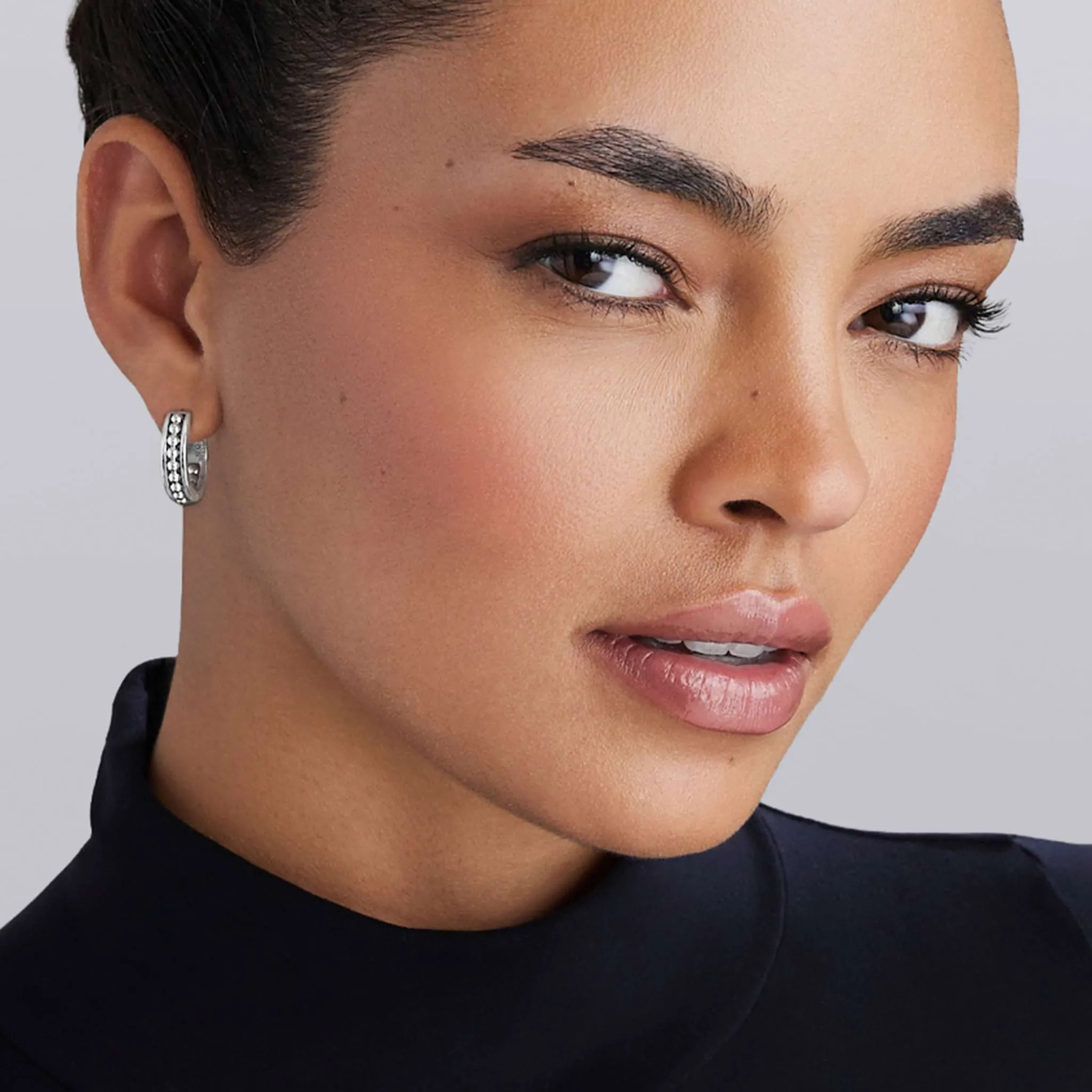 Signature Caviar Petite Sterling Silver Caviar Huggie Earrings sold by LAGOS product image thumbnail 2