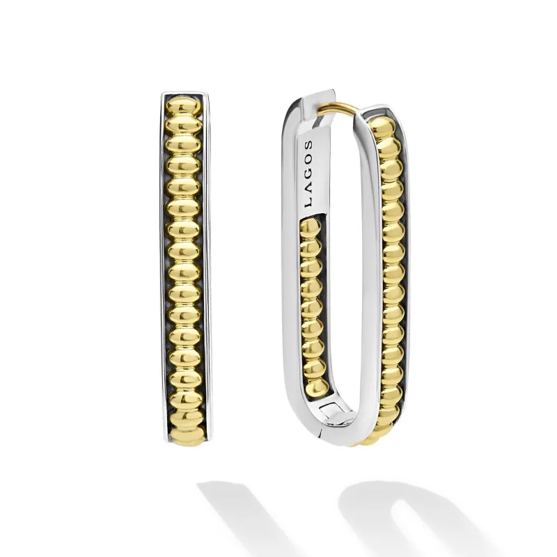 Signature Caviar Large Two-Tone Linear Hoop Earrings sold by LAGOS