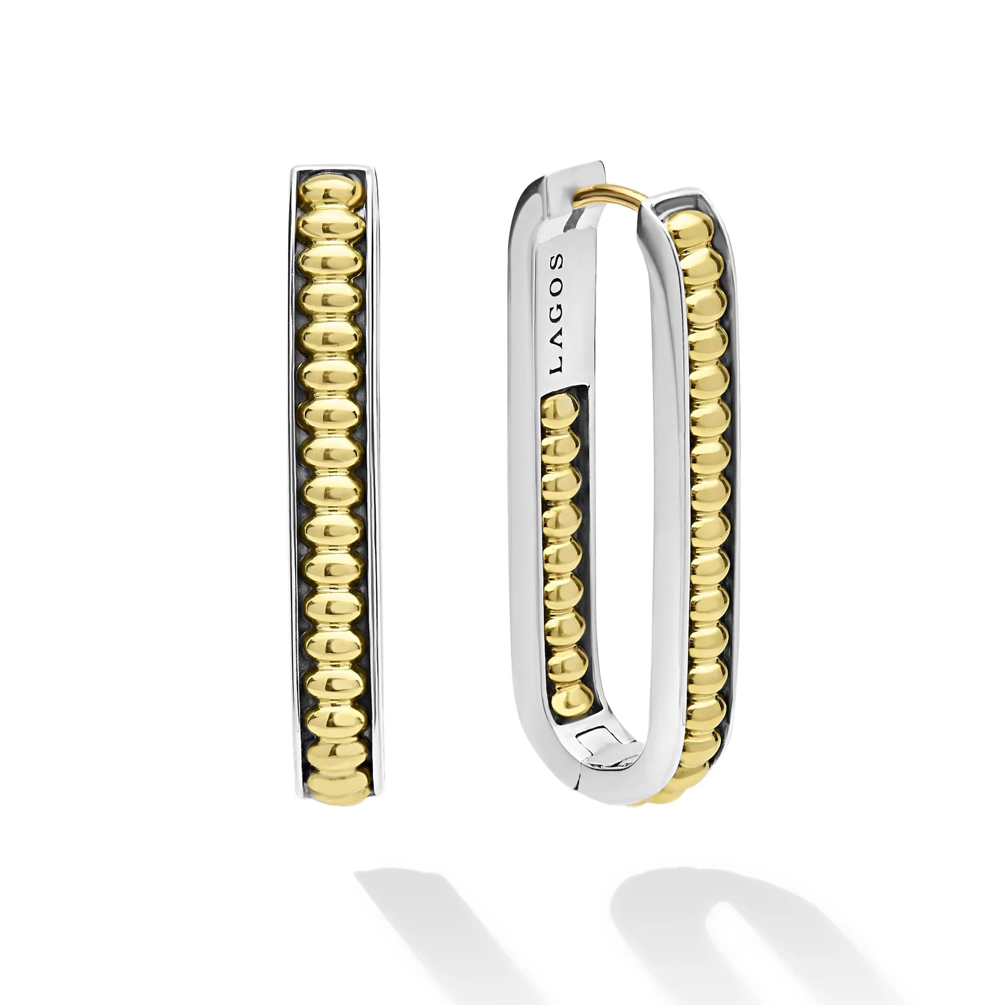 Signature Caviar Large Two-Tone Linear Hoop Earrings sold by LAGOS