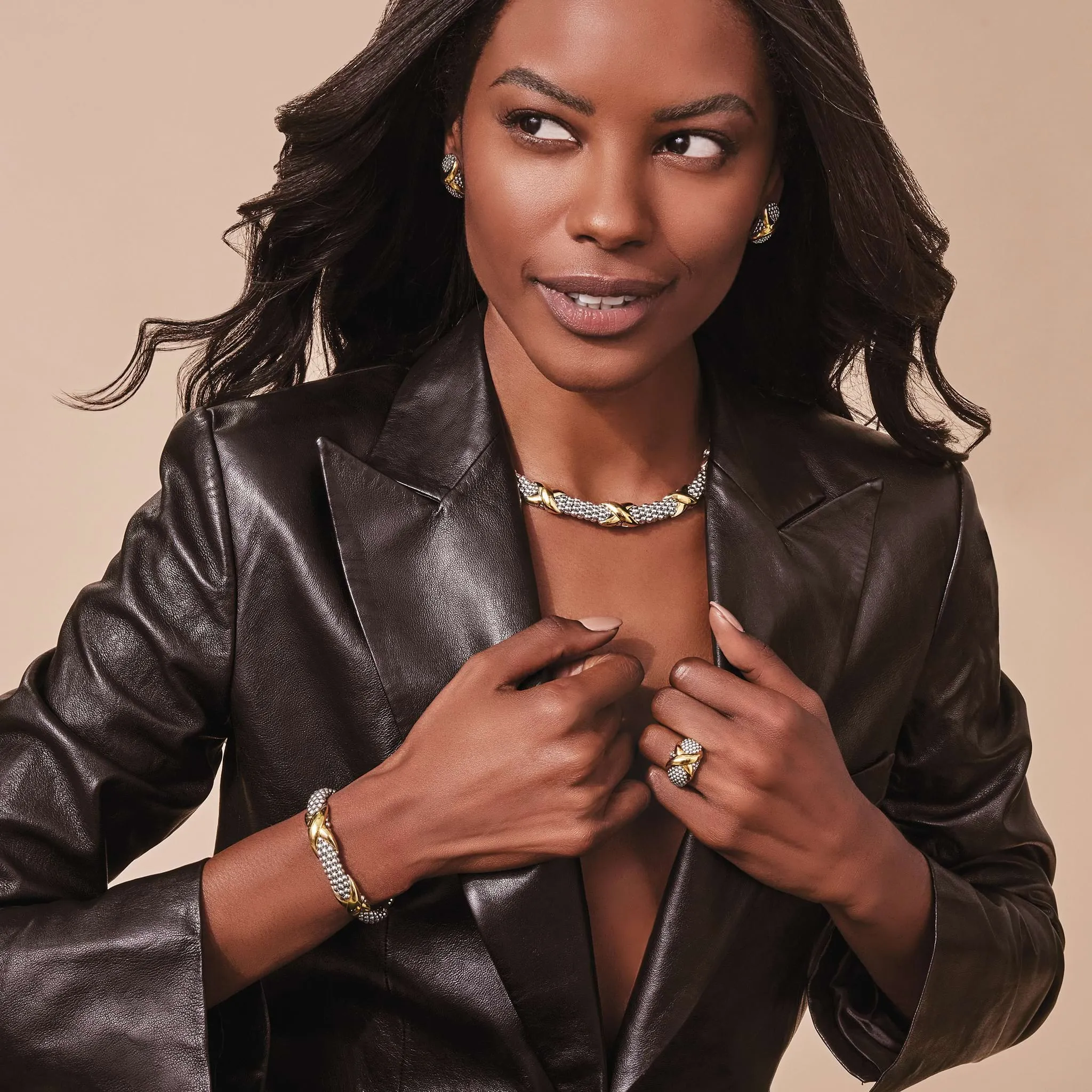 Embrace Two-Tone X Huggie Earrings sold by LAGOS product image thumbnail 5