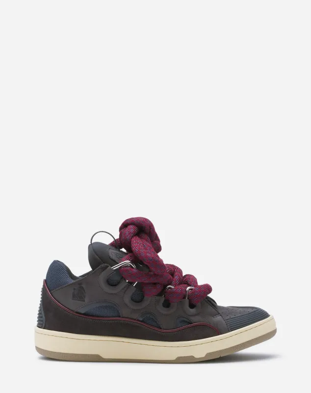 CURB SNEAKERS IN LEATHER WITH SNAKE LACES sold by Lanvin