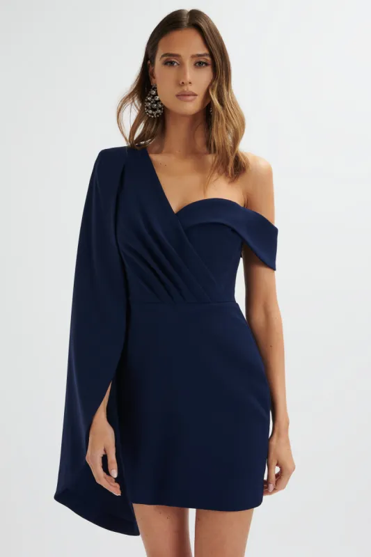 AIZA Asymmetric Cape Mini Dress In Navy made by Lavish Alice
