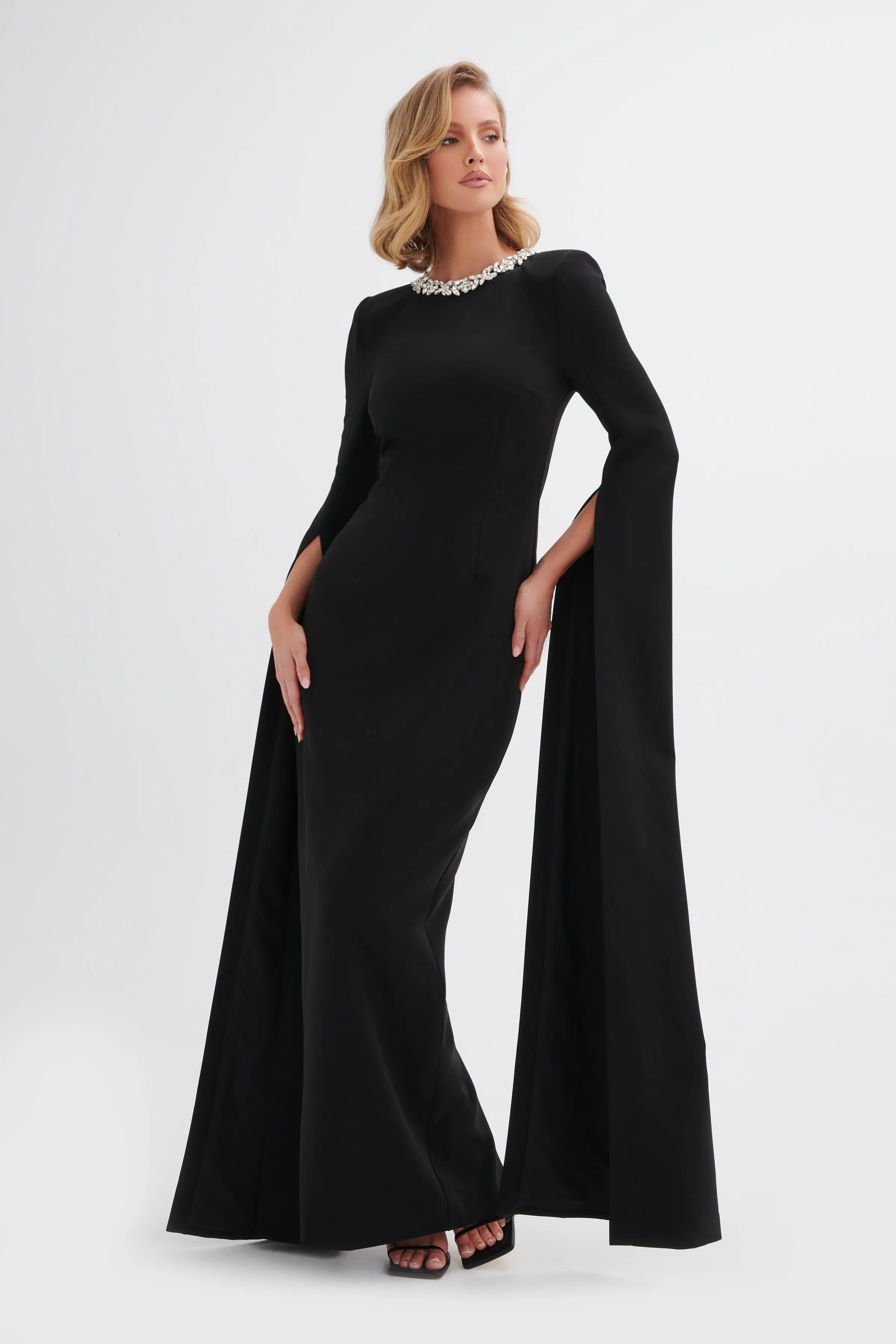 KELLY Cape Sleeve Maxi Dress in Black sold by Lavish Alice