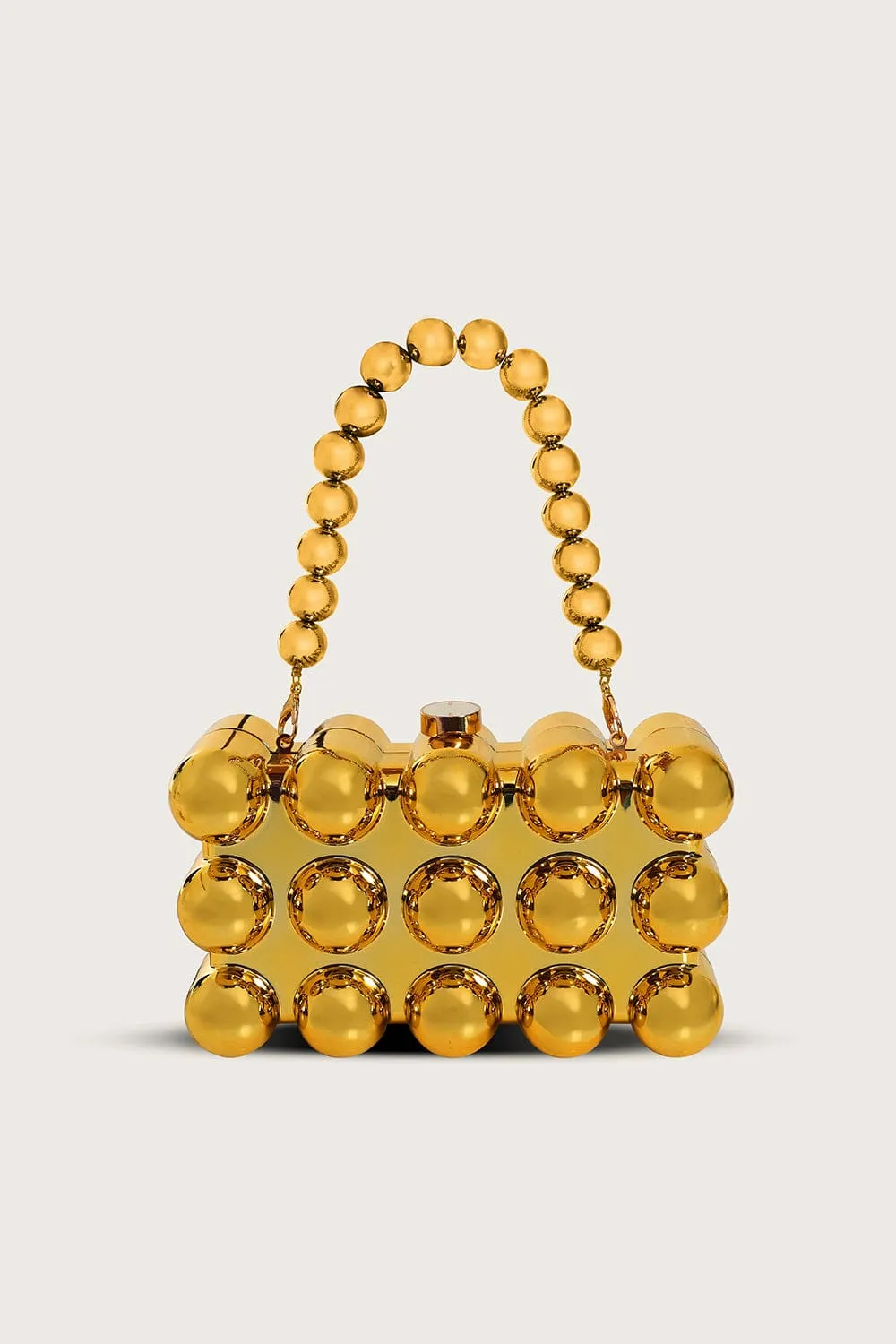 MAIA Spherical Acrylic Clutch Bag in Gold sold by Lavish Alice