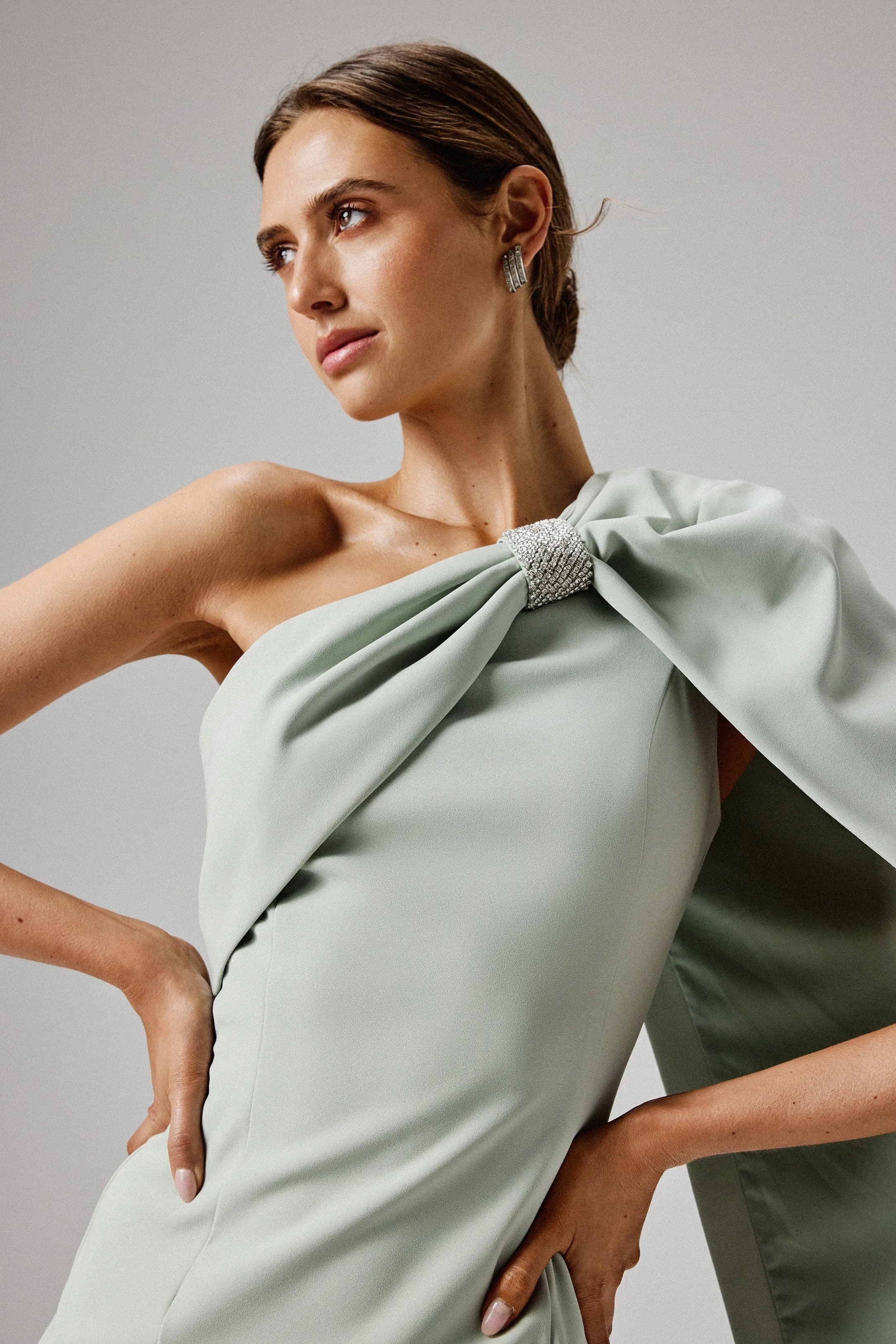 TINA One Shoulder Embellished Bow Cape Midi Dress in Sage Green | Parallel