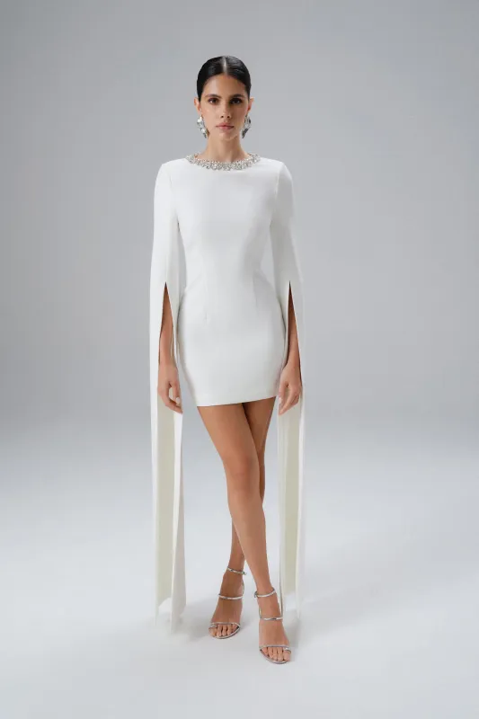 TILLY Cape Sleeve Mini Dress in White sold by Lavish Alice