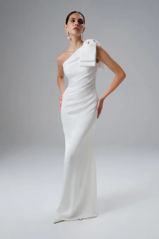 EMELIA One Shoulder Bow Pleated Maxi Dress in White sold by Lavish Alice
