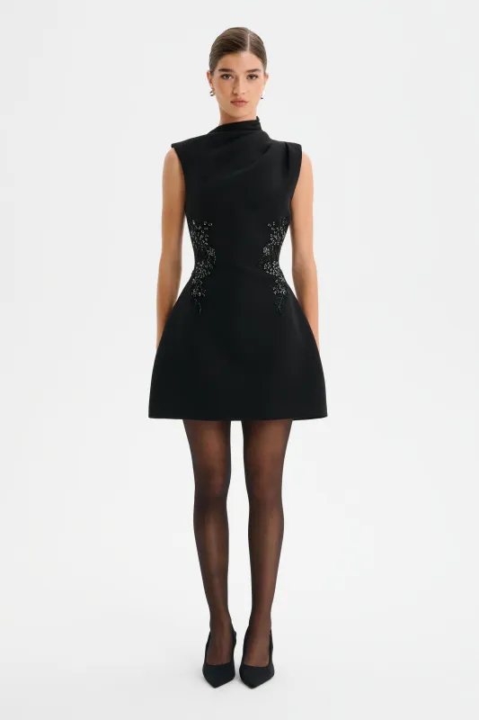 AMBAR Asymmetric High Neck Embellished Tulip Mini Dress in Black made by Lavish Alice