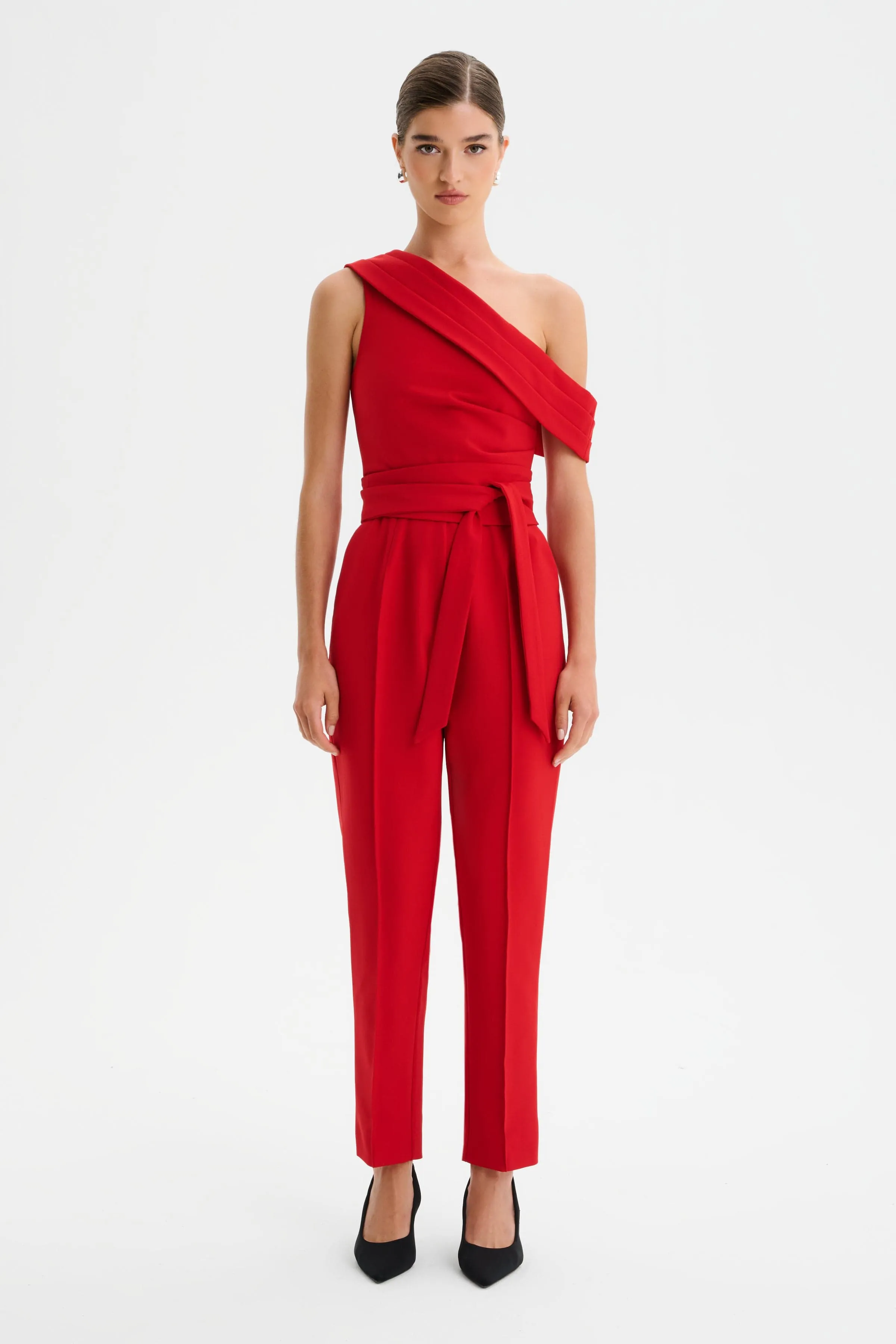 SOFIE Off Shoulder Pleated Obi Belted Jumpsuit in Red sold by Lavish Alice
