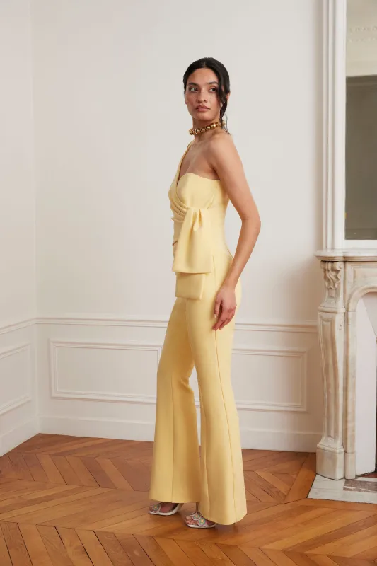 HALLIE One Shoulder Jumpsuit With Bow Detail In Yellow sold by Lavish Alice