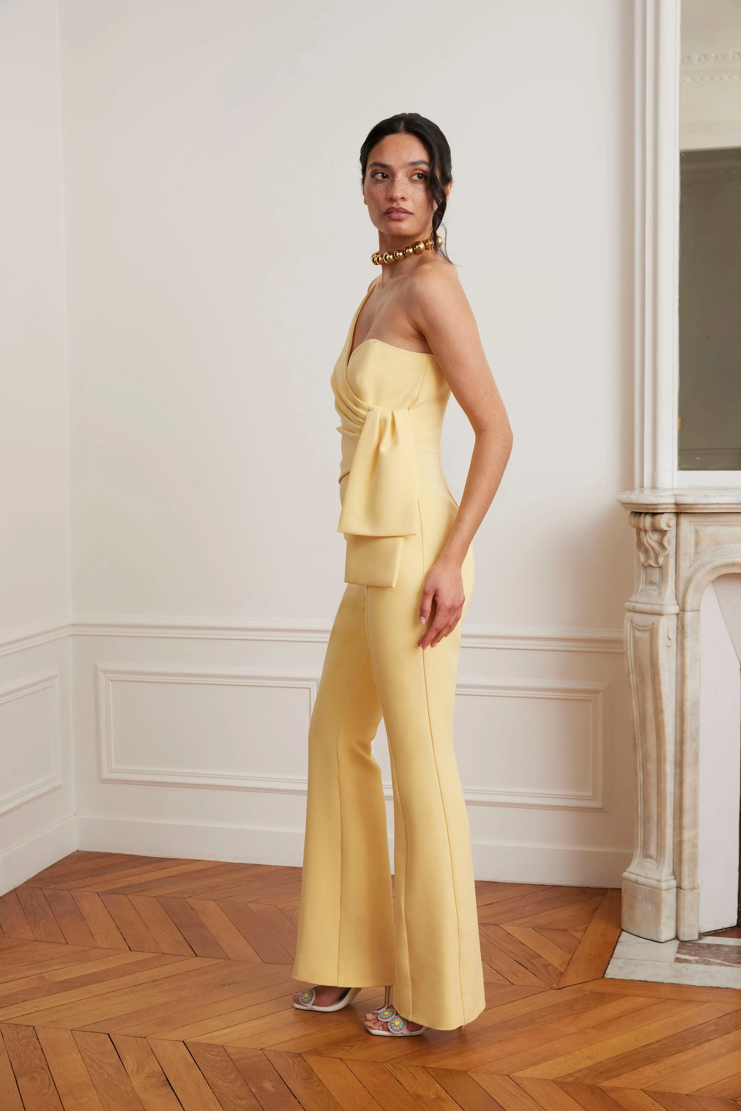 HALLIE One Shoulder Jumpsuit With Bow Detail In Yellow sold by Lavish Alice