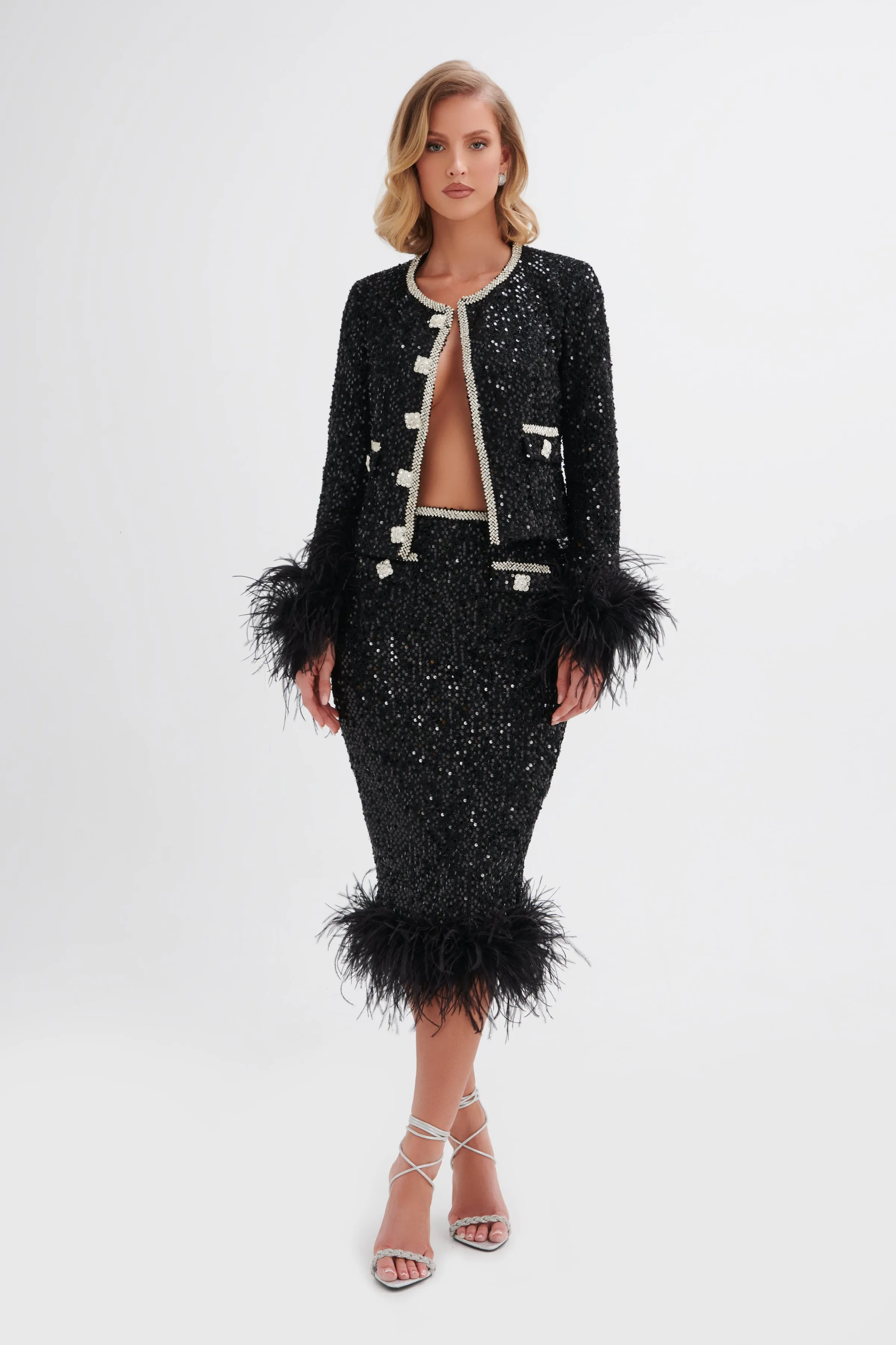 UND FEATHER LIKE BOLERO