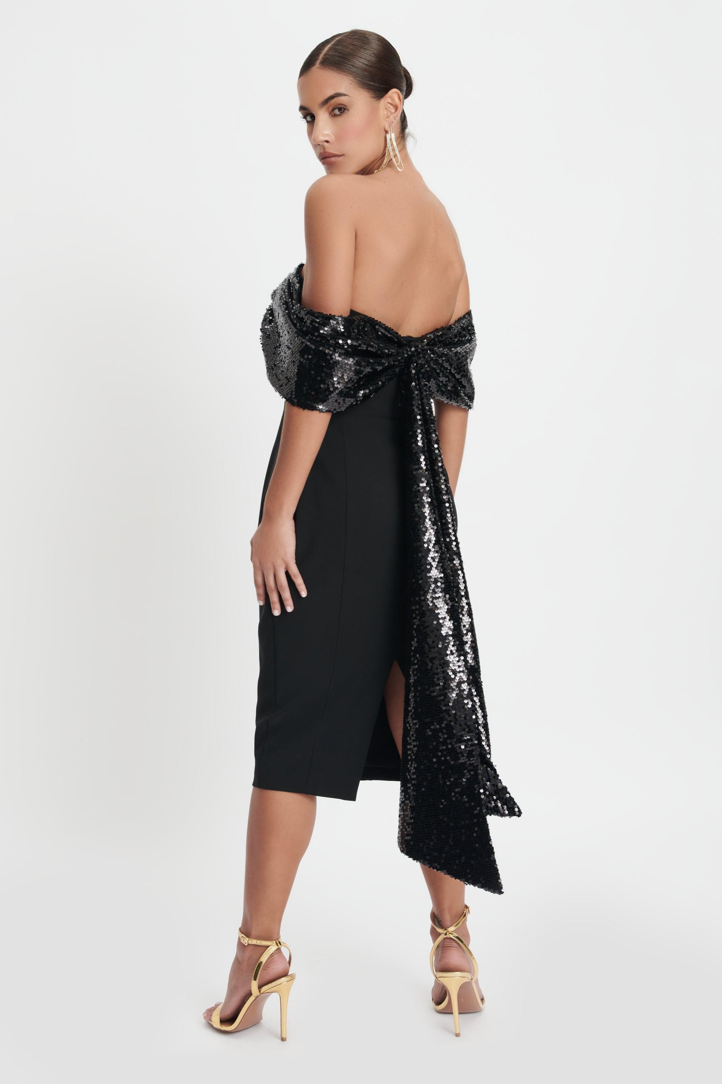 THALIA Statement Sequin Bow Midi Dress In Black sold by Lavish Alice