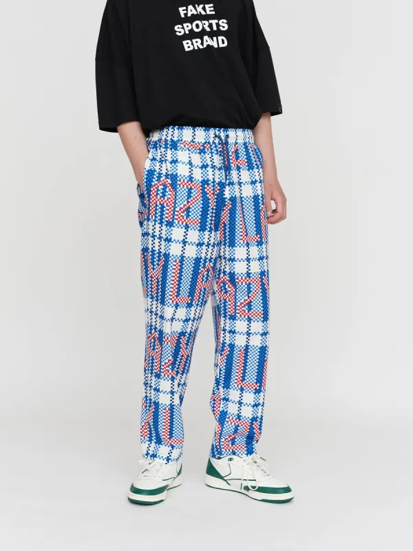 Checked Out Woven Trackpants sold by Lazy Oaf