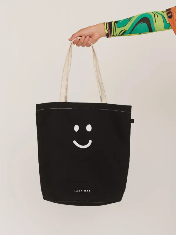 Black Happy Sad Tote Bag sold by Lazy Oaf