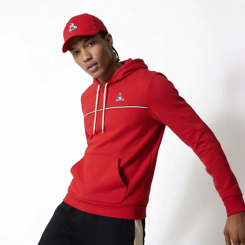 2610121-TRI SP Hoody N°1 M now/rouge camuset chi | Sweat à capuche Homme sold by Le Coq Sportif