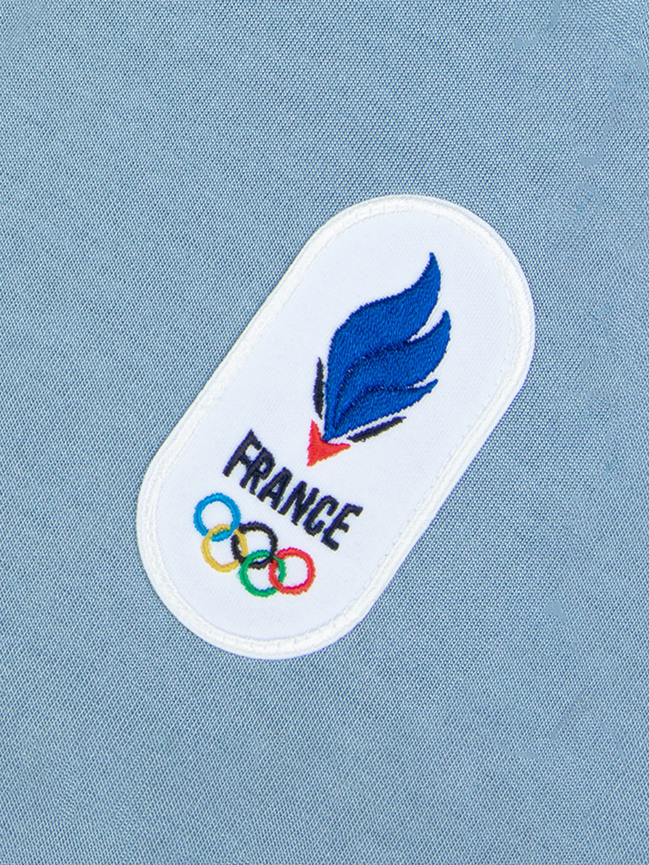 Polo Équipe de France Olympique 2026 en jersey technique sold by Le Coq Sportif product image thumbnail 3