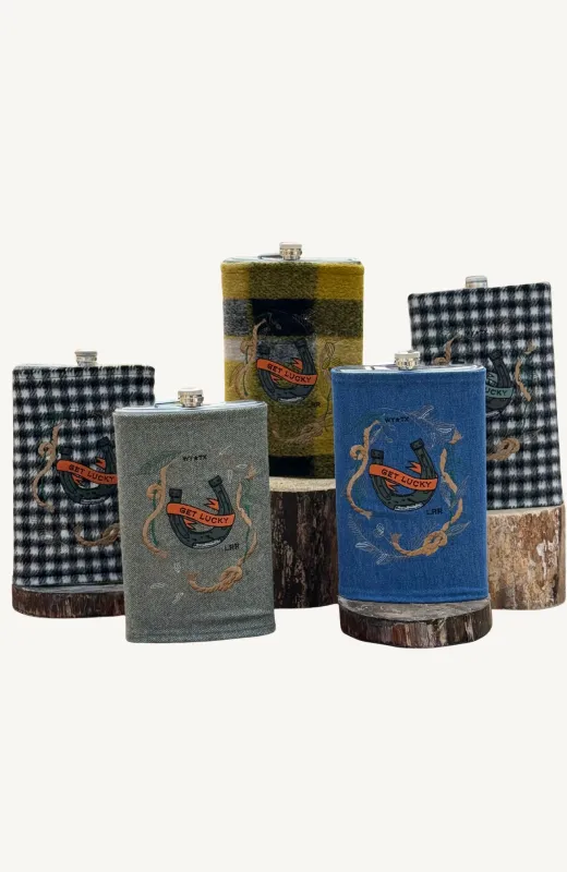 Embroidered "Get Lucky" Flasks sold by Lela Rose
