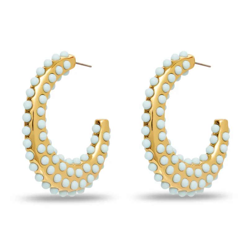 POWDER BLUE ARCHER HOOP EARRINGS sold by Lele Sadoughi