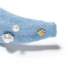 LIGHT DENIM PEARL BEZEL KNOTTED HEADBAND sold by Lele Sadoughi