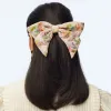 DUSK FAIRYTALE FOREST PRINTED BOW BARRETTE sold by Lele Sadoughi