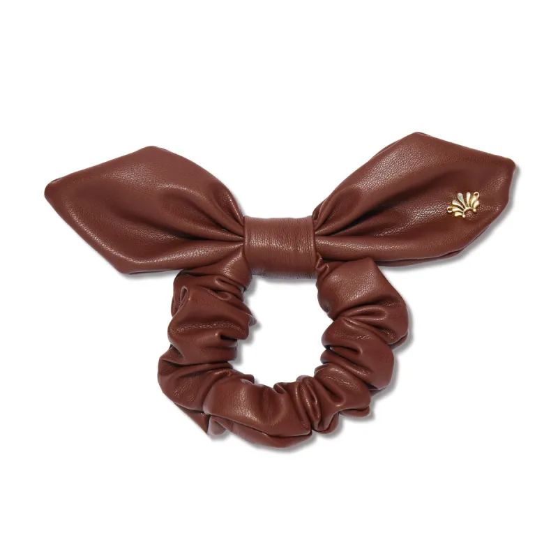 WALNUT FAUX LEATHER VERONICA BOW SCRUNCHIE sold by Lele Sadoughi