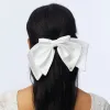 PORCELIN ELIZABETH SILK BOW BARRETTE sold by Lele Sadoughi