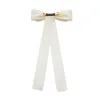 IVORY JANE BOW BARRETTE sold by Lele Sadoughi