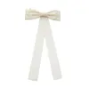 IVORY JANE BOW BARRETTE sold by Lele Sadoughi